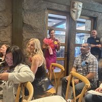 Candid photo: pictured Lt to Rt: Anna D., Katelyn A., Cassendra M., Rich R., Stryker Rep.