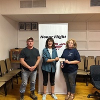 Presenting donation to Honor Flight 