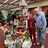 Meg Beturne and her husband at the Springfield Festival of Trees fundraiser, themed based in memory of their daughter Karen.  This year's theme was CATS! The CEO of Dakin Human Society received a donation for a CAT including all fees.