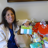 WHC Chapter President Laura Espinosa with donations to Connor's closet