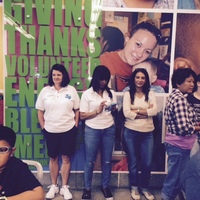 Chapter members waiting for assignment at Houston Food Bank