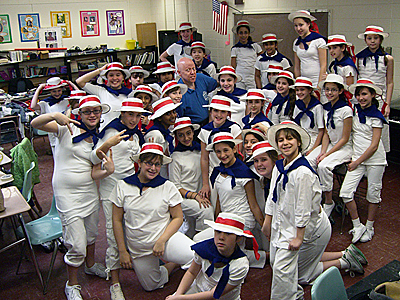 Students from the Syosset school district with Artistic Director Albert Bergeret.