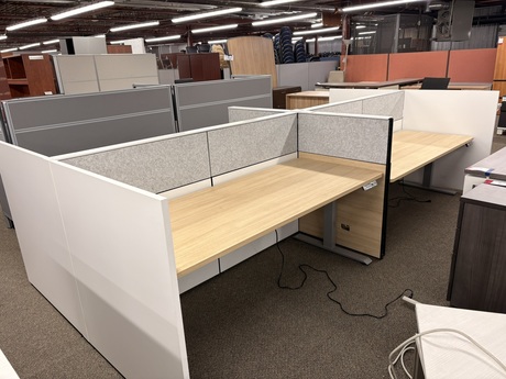 Photo of Axel workstations with adjustable tables. Ginger Root and White laminate,, vue 1, available at Oburo in Montreal