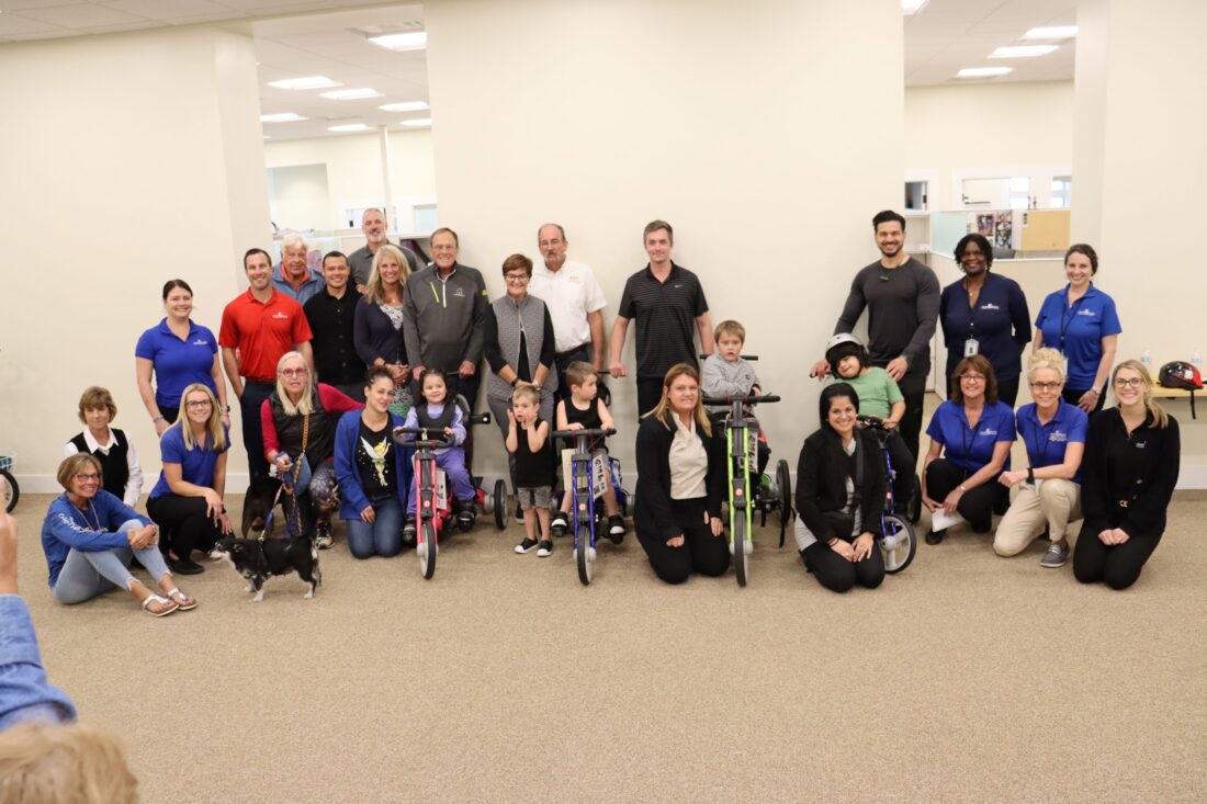 Robbie's Riders, Grampy's Charities and Sanibel Captiva Community Bank present four custom-made, adaptive tricycles to local children with special needs | News, Sports, Jobs - Vimarsana News