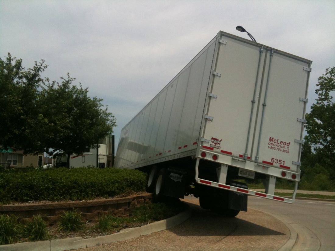 Photo gallery Semi truck crashes into roundabout on Williams