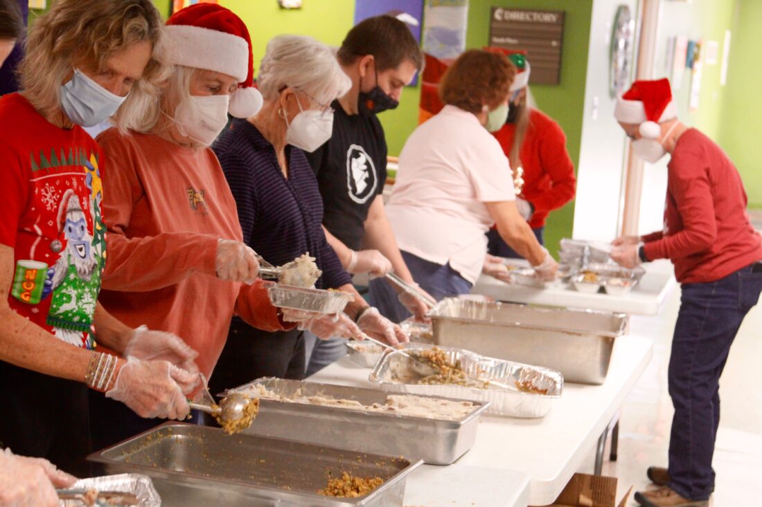 Volunteers prepare and serve nearly 1,000 meals for annual Community Christmas Dinner | News, Sports, Jobs - Lawrence Journal-World: news, information, headlines and events in Lawrence, Kansas - Vimarsana News