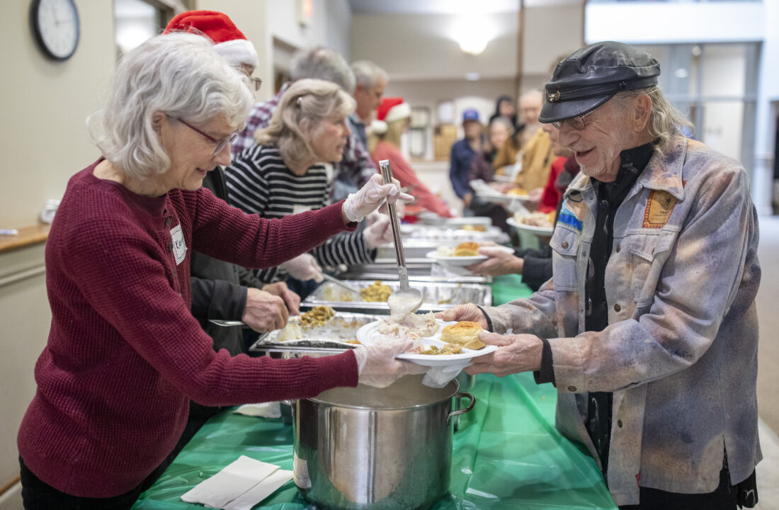 Photos: Volunteers serve more than 1,000 meals at community Christmas dinner | News, Sports, Jobs - Lawrence Journal-World: news, information, headlines and events in Lawrence, Kansas - Vimarsana News