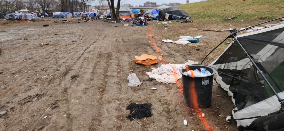 City paints orange line at homeless camp along river levee, denoting where campers can no longer be | News, Sports, Jobs - Lawrence Journal-World: news, information, headlines and events in Lawrence, Kansas - Vimarsana News