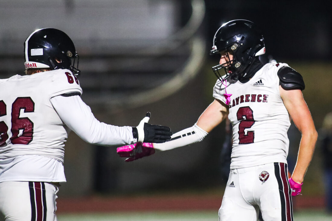 Lawrence football season ends with 50-40 shootout loss to Shawnee Mission Northwest