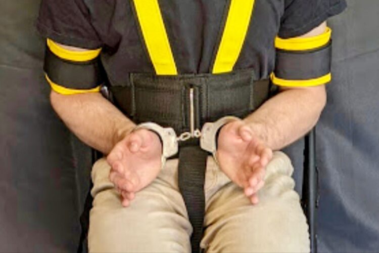 ICE’s use of full-body restraints during deportations raises concerns over inhumane treatment