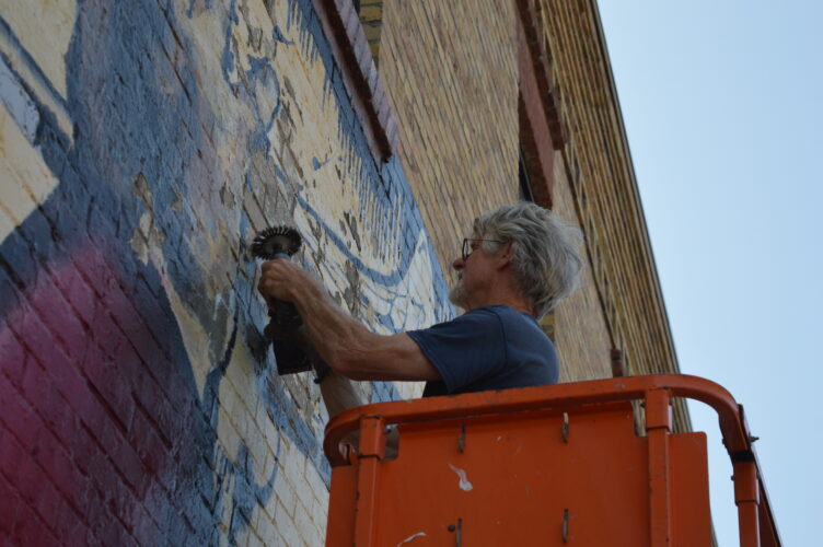 A touch-up for a downtown mural | News, Sports, Jobs - Vimarsana News