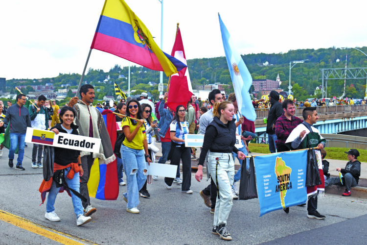 Parade of Nations takes community around the world | News, Sports, Jobs - Vimarsana News