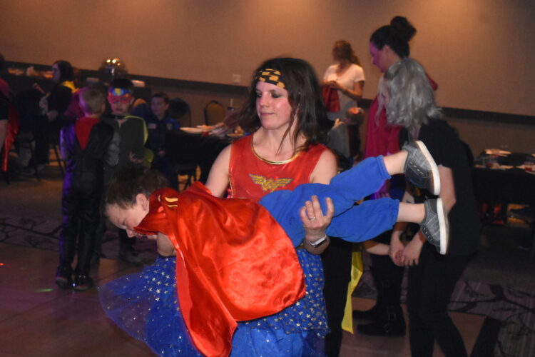 Moms create memories with superhero sons on dance floor | News, Sports, Jobs - Vimarsana News