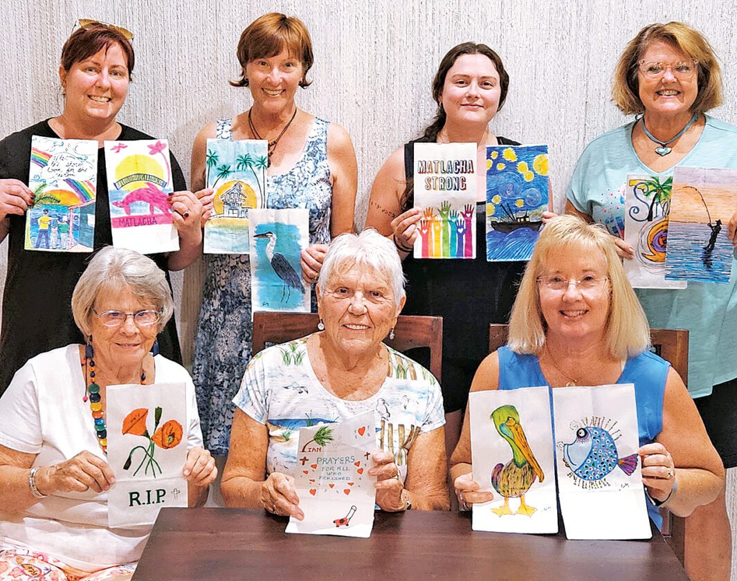Island artists paint luminaries for Ian Remembrance Service | News, Sports, Jobs - Vimarsana News