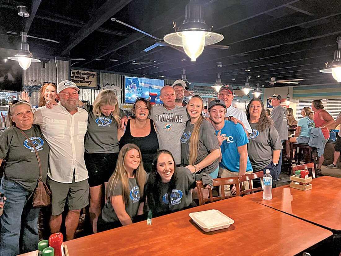 Staff surprises owners with anniversary party at Blue Dog Bar and Grill | News, Sports, Jobs - Vimarsana News