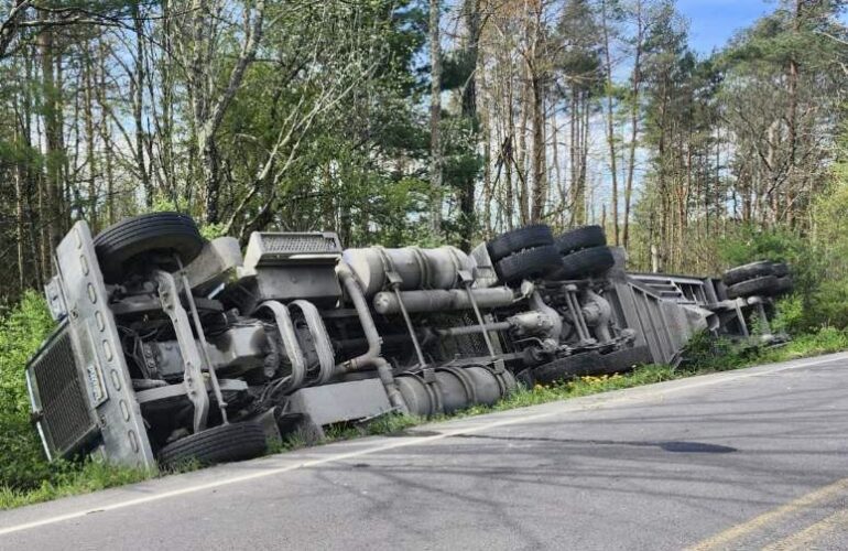 Tractor-trailer hauling sand overturns in Cascade Township | News, Sports, Jobs - Vimarsana News
