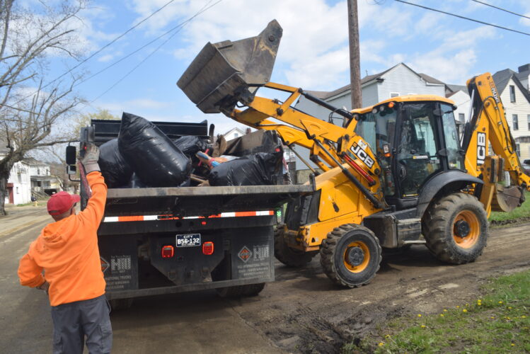 Crews Collect Flood-Destroyed Items on Wheeling Island | News, Sports, Jobs - Vimarsana News