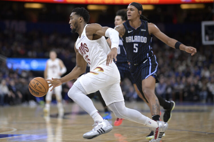 Mitchell scores 25, as Cavaliers throttle Magic