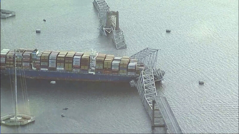Cargo ship hits Baltimore&rsquo;s Key Bridge, bringing it down. Rescuers are looking for people in water