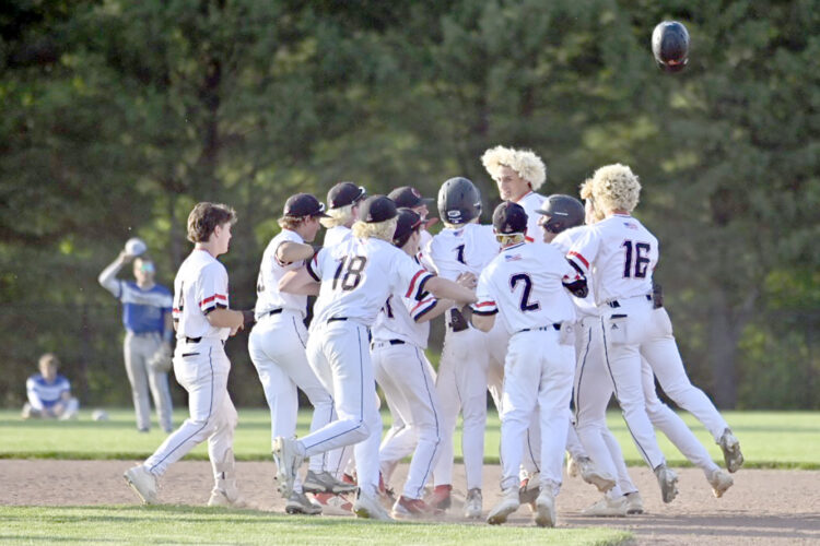 Canfield rallies by Hubbard in extras