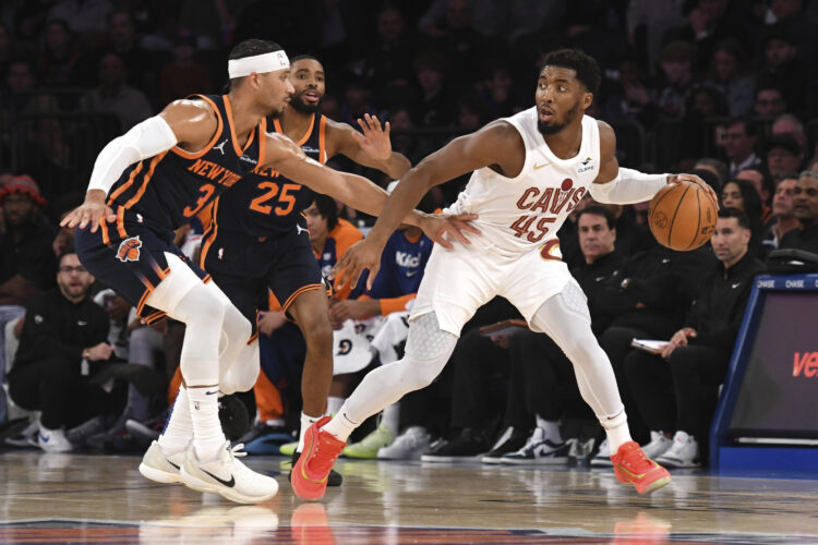 Garland scores 34 points to rally Cavaliers past the Knicks