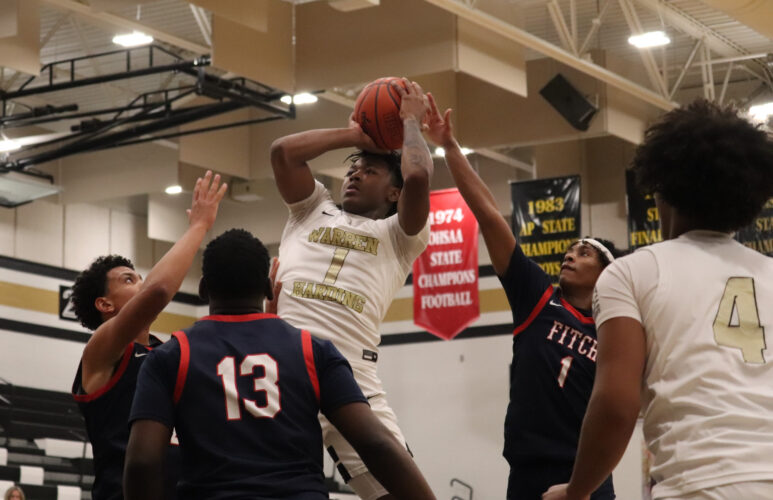 Harding returns from break to beat Fitch