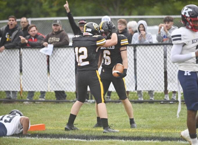 Garfield races away from Warren JFK, 36-14