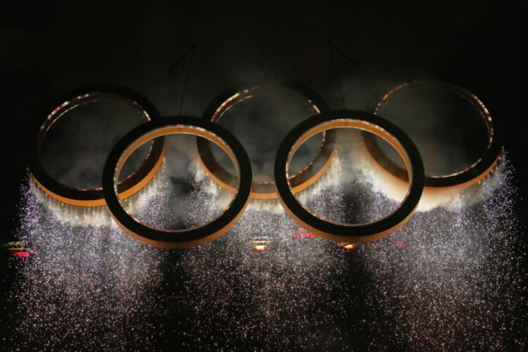 Olympics open with multi-site ceremony