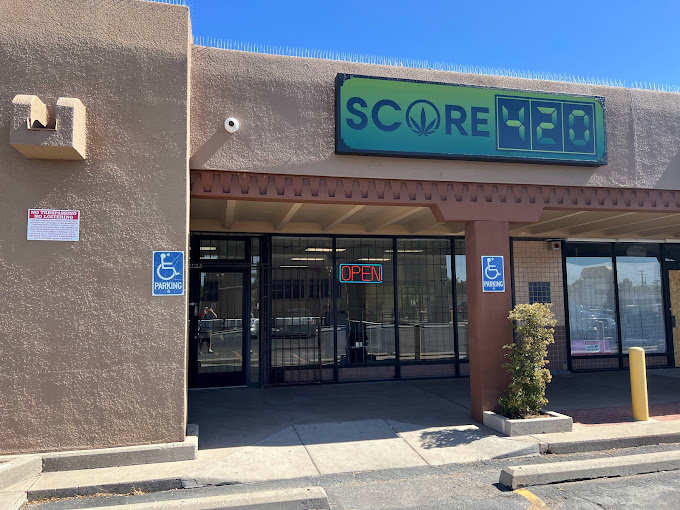 What events or promotions does Old Town ABQ Dispensary host?