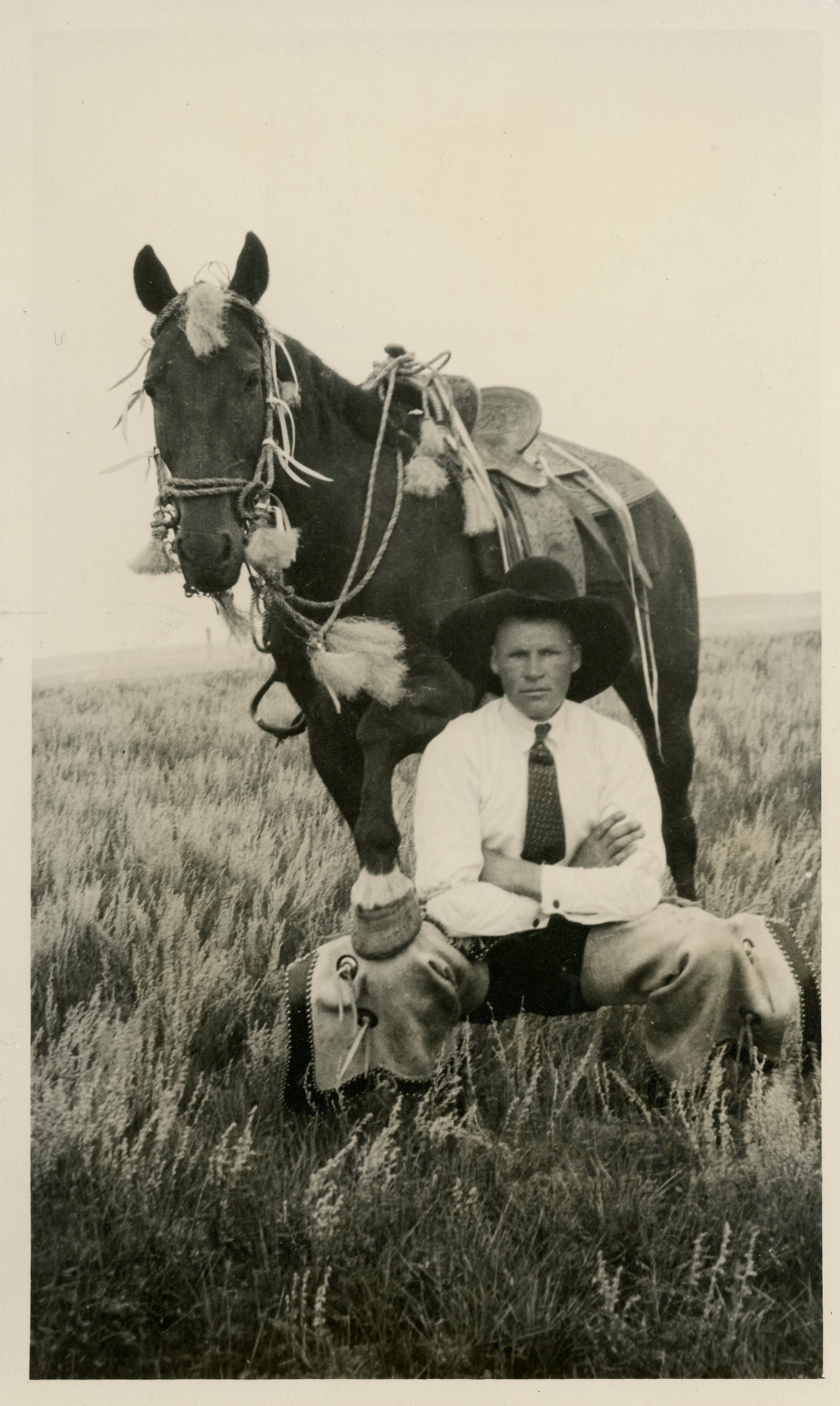 CS.1999.15.116, Cowboy beside horse.jpg