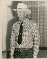 Man in western wear & cowboy hat