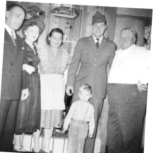 Tom with family 1952 on leave from Air Force.jpg