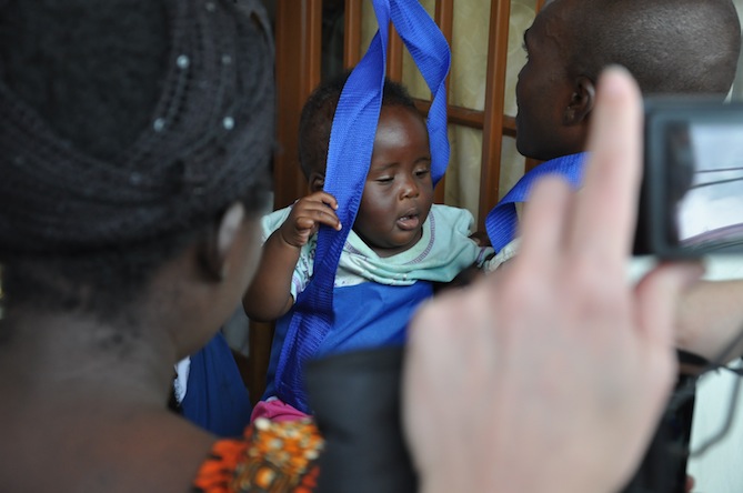 Children's measurements are also taken at the hospital. ("Mom! Get me outta here!"). Photo credit: Carl Forti.