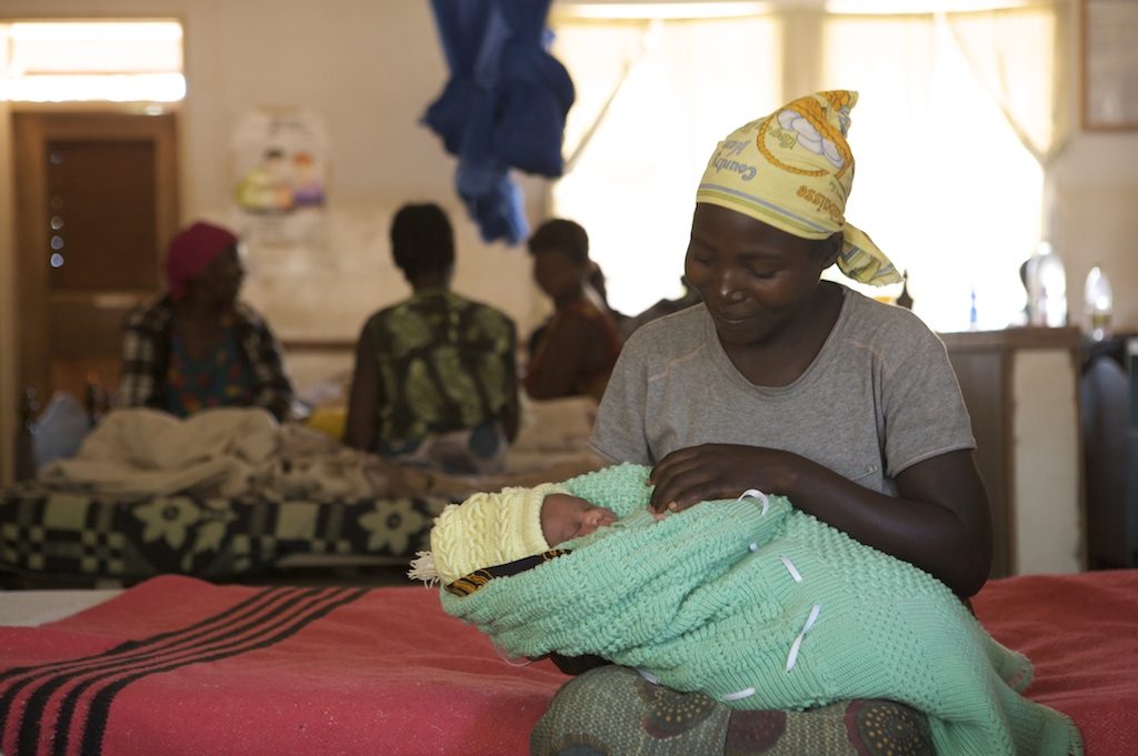 A mother swaddles her baby at Ekwendeni Hospital in Malawi.