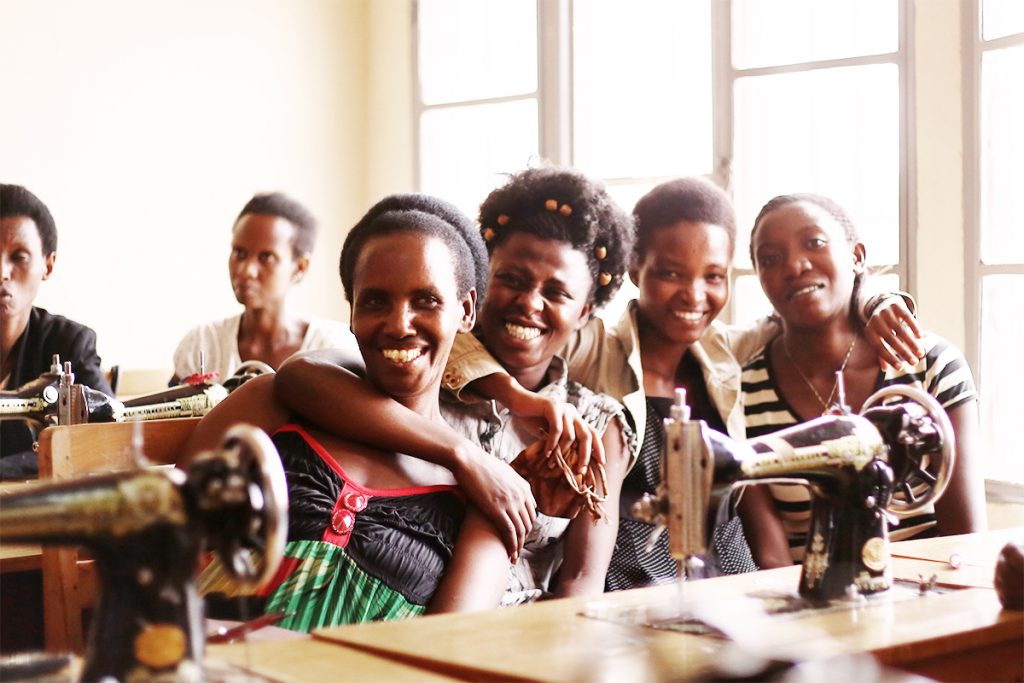 Artisans and trainees at Abasangiye Cooperative. (Photo credit: Indego Africa)