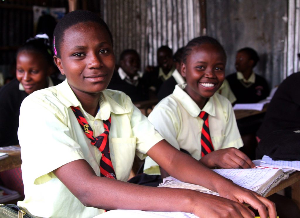Female students in class at City Shine Secondary School.