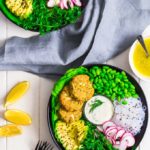 Low-Carb Salmon Patties on a bed of greens.