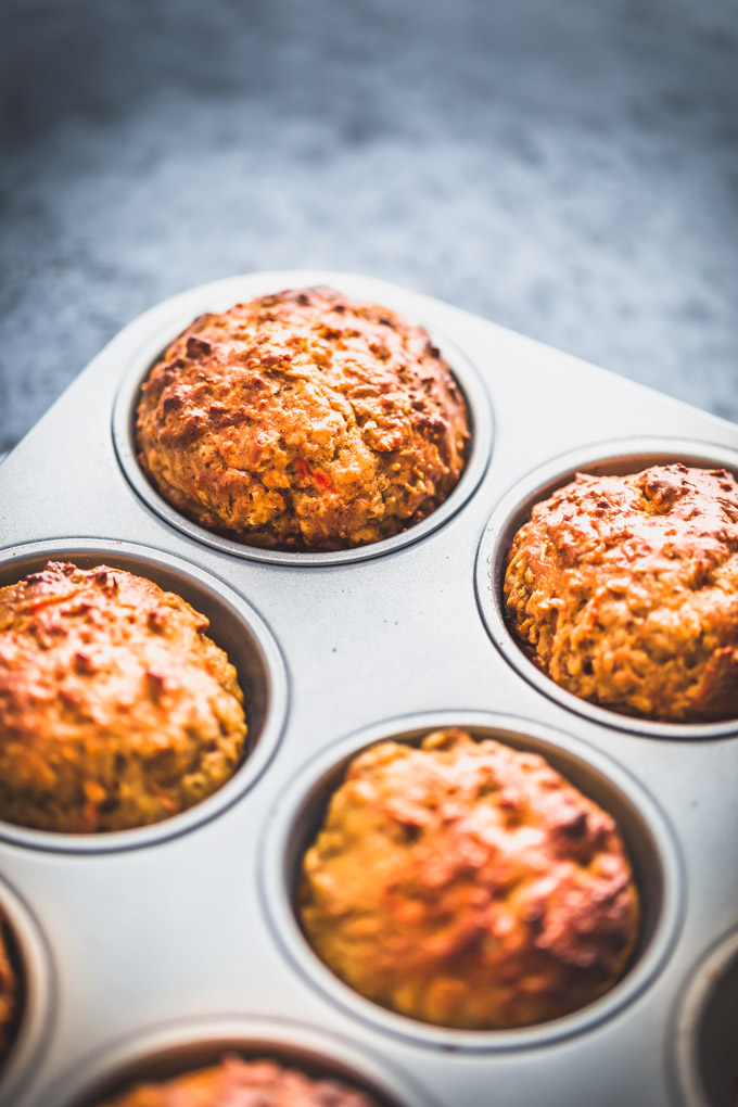 Carrot Cake Protein Muffins in a muffin tin