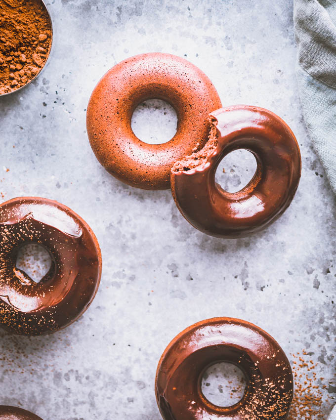 4 protein donuts arranged on a blue background