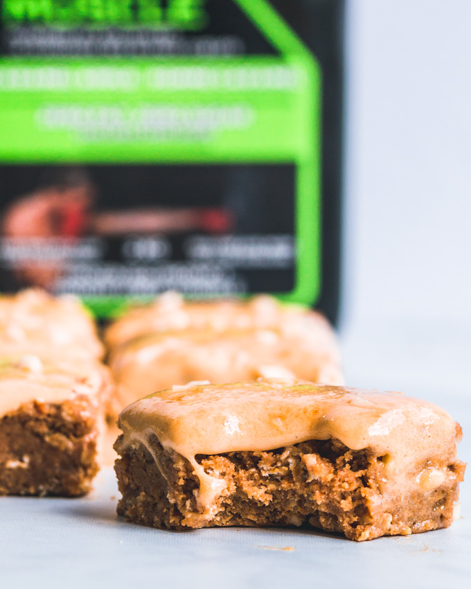 Caramel oatmeal protein bars with a bite taken