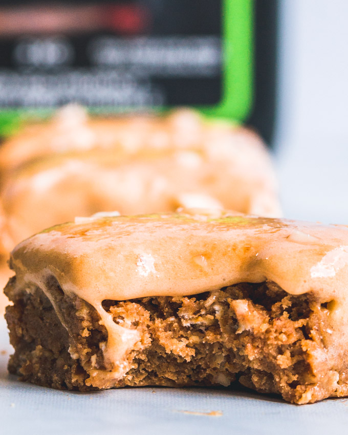 Caramel oatmeal protein bars with a bite taken. Closeup shot