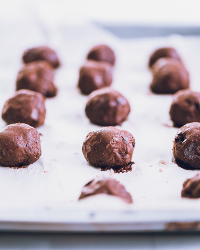 Candy Cane Protein Truffles, uncoated, on parchment paper