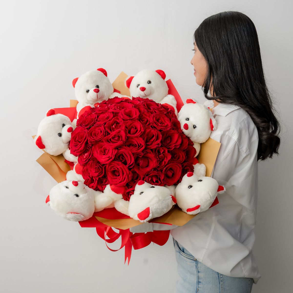 Bouquet 50 rosas y 7 peluches