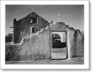 Full side view of entrance with gate to the...