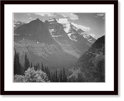 Valley, snow covered mountains in background,...