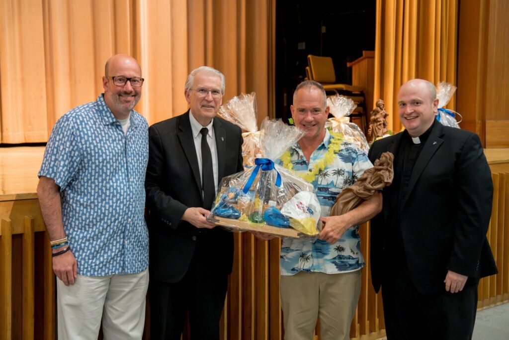 Mr. Tahany says farewell to his teaching life last June. (L-R) Asst, Principal Mr. York, Principal Bro. Kenneth Hoagland, Mr. Tahany, Chaplain Fr. Dan Griffin