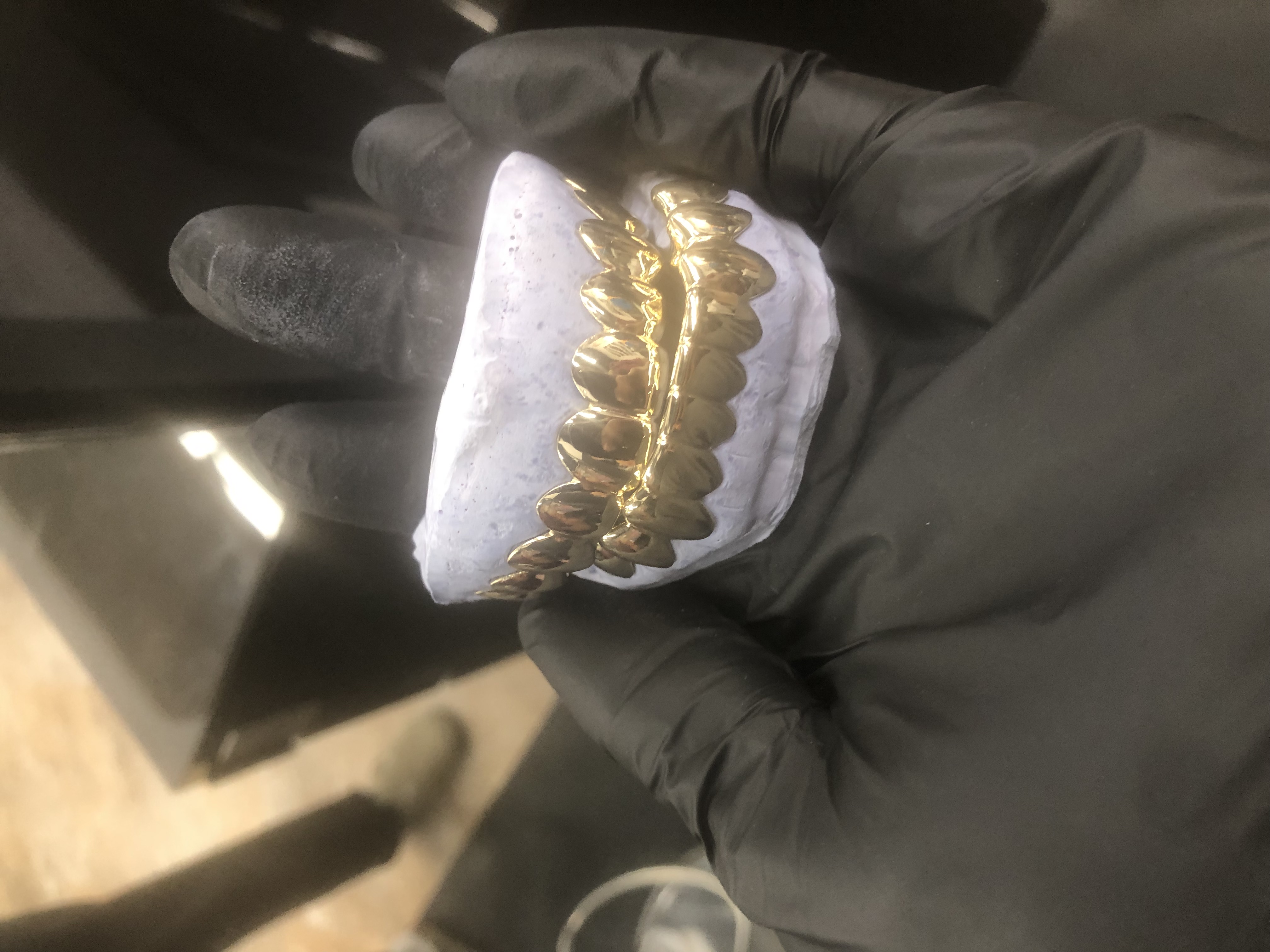 Heru grillz : Diamond gold teeth Image