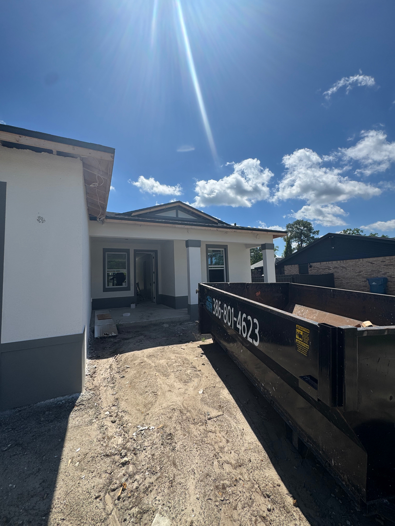 The McFarlane Construction Group Inc Logo