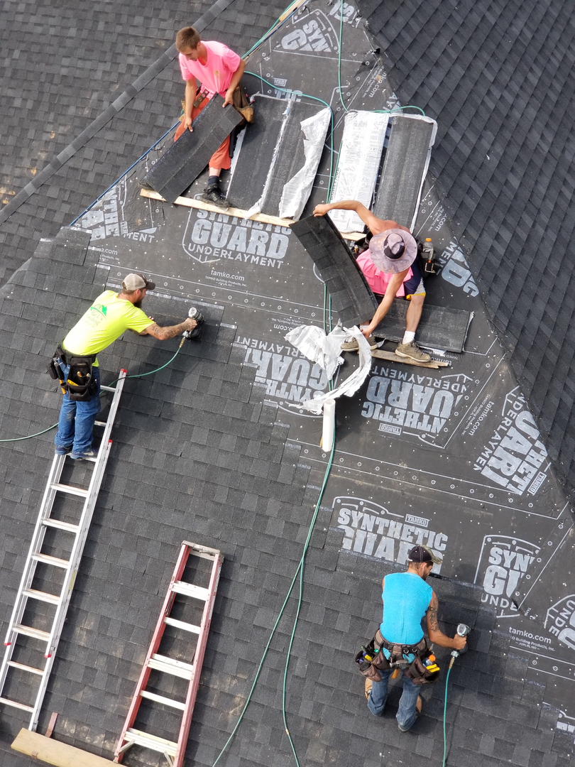 Rick's Roofing Logo