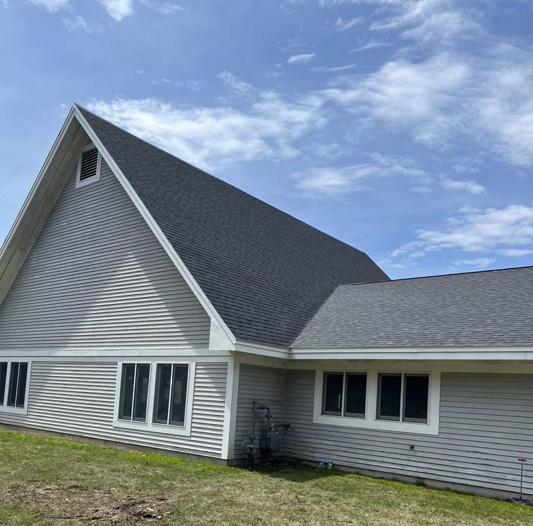 Over the Top Roofing Image